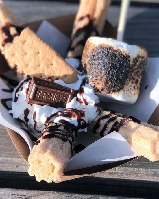 Churros and desserts served from The Snowy Churro truck at a Front Range celebration